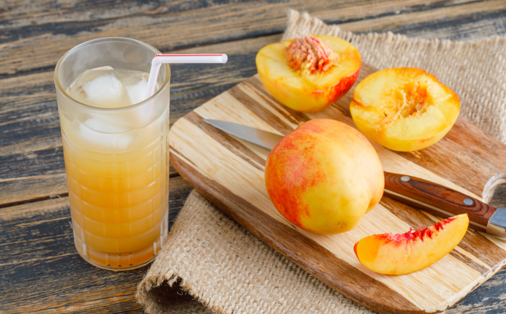 nectarines-with-cutting-board-juice-knife-wooden-piece-sack